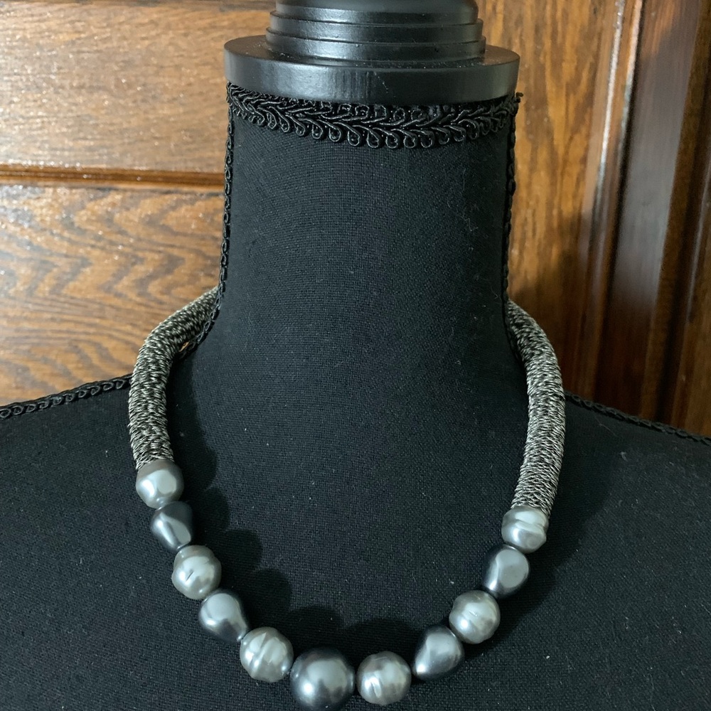 Silver Bead necklace. Approx 9” long. Has an extender can be longer.